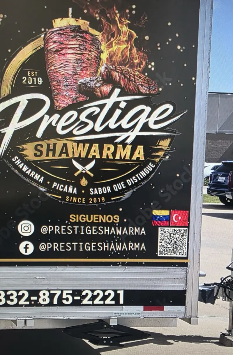 Rear panel of a food trailer with printed restaurant graphics, by ExpressAutoTNT in Katy, TX